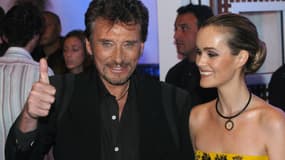 Johnny Hallyday et Laeticia, en octobre 2003 à l'Amnesia à Paris.