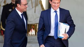 François Hollande raccompagne Manuel Valls alors qu'il quitte l'Elysée, le 3 septembre 2014.