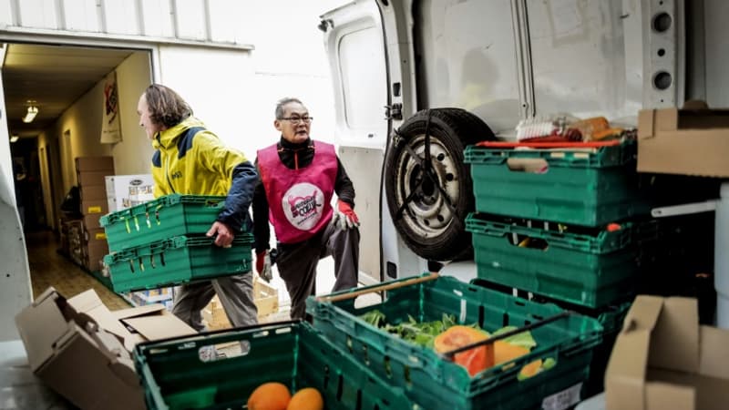 Qui a sauvé les Restos du coeur de la banqueroute?