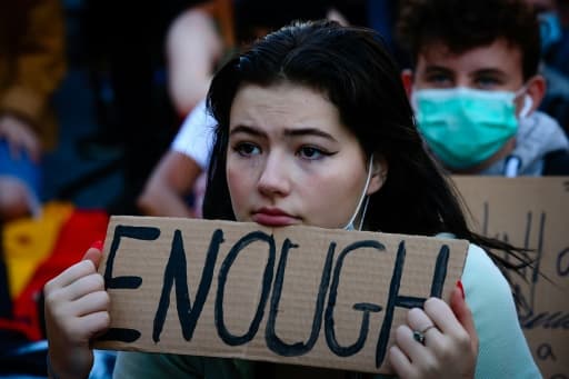 Manifestante dénonçant les inégalités raciales à Brisbane, en Australie, le 6 juin 2020. Manifestante dénonçant les inégalités raciales à Brisbane, en Australie, le 6 juin 2020.