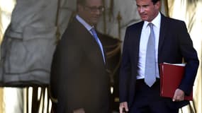 Manuel Valls et François Hollande à la sortie de l'Elysée ce mardi 26 août.