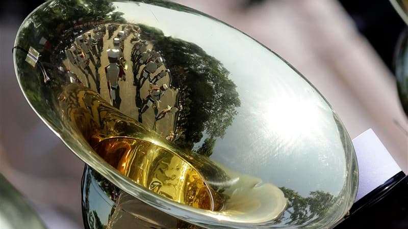 Des troupes maliennes ont ouvert dimanche aux côtés de militaires français le défilé du 14-Juillet sur les Champs-Elysées, à Paris, pour marquer le succès de l'opération "Serval" engagée à la mi-janvier par la France au Mali. /Photo prise le 14 juillet 20