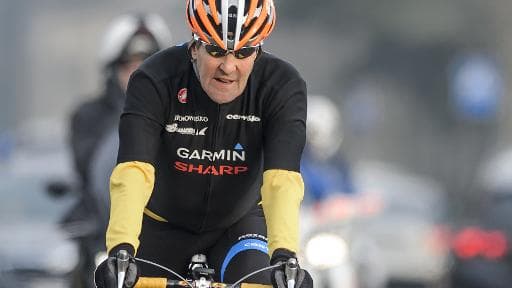 Le secrétaire d'Etat américain John Kerry à vélo à Lausanne, le 16 mars 2015