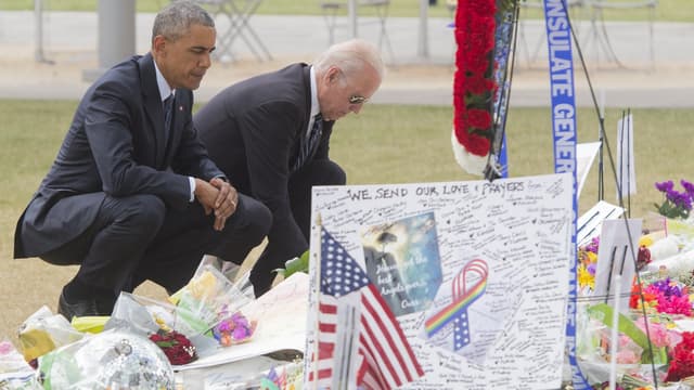 Barack Obama et Joe Biden se recueillent à Orlando, en Floride, le 16
SAUL LOEB / AFP