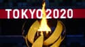 La vasque olympique brûle au Stade Olympique, à la fin de la cérémonie d'ouverture des Jeux de Tokyo, le 23 juillet 2021