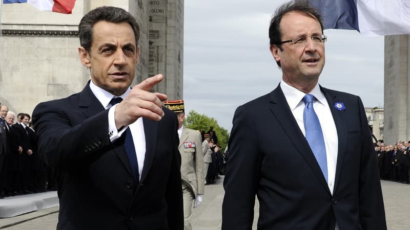 François Hollande et Nicolas Sarkozy en mai 2012, au pied de l'Arc de Triomphe, à Paris.