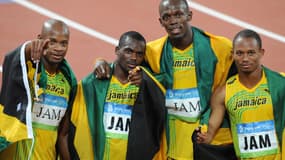 Asafa Powell, Nesta Carter, Usain Bolt et Michael Frater 