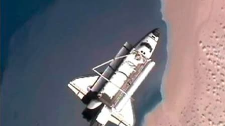 La navette américaine Discovery a quitté lundi la Station spatiale internationale (ISS) après avoir livré un nouveau module de stockage, un robot et plusieurs tonnes de fournitures à l'occasion de sa 39e et dernière mission dans l'espace. /Image TV du 7 m