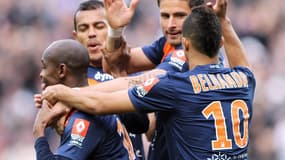 Camara félicité par ses coéquipiers Giroud, Hilton et Belhanda