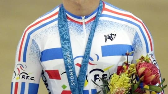 Le Français Florian Rousseau, médaillé d'or du keirin, le 21 septembre 2000 aux Jeux Olympiques de Sydney