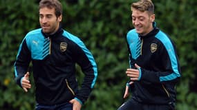 Mathieu Flamini et Mezut Ozil