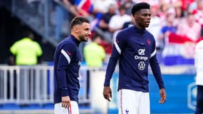 Clauss et Tchouameni à l'échauffement avant d'affronter la Croatie en Ligue des nations, le 13 juin 2022