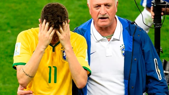 Oscar et Scolari après Brésil-Allemagne (1-7)