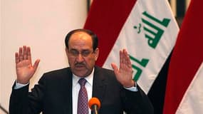 Le parlement irakien a approuvé la reconduction de Nouri al Maliki au poste de Premier ministre, après neuf mois de tractations politiques depuis les élections législatives du 7 mars. /Photo prise le 21 décembre 2010/REUTERS/Saad Shalas