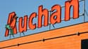 Auchan obtient un mandat de Metro.