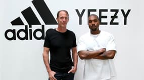 Le directeur marketing d'Adidas Eric Liedtke et le rappeur Kanye West.
