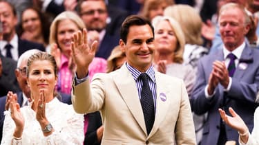 Roger Federer aux côtés de sa femme, à Wimbledon. 4 juillet 2023