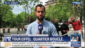 La Tour Eiffel évacuée, un homme en train d'escalader le monument
