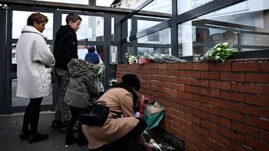 Des habitants déposent des fleurs devant le collège André-Maurois, d'Épinay-sur-Orge, en Essonne, après la mort de Louise, une collégienne de 11 ans scolarisée dans l'établissement, le 8 février 2025