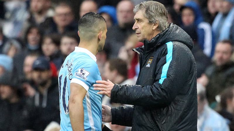 Sergio Agüero réconforté par Manuel Pellegrini