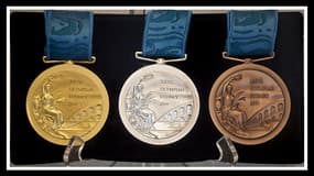 Ces médailles datent des JO de Sydney, en 2000, elles n'étaient  alors pas fiscalisées.