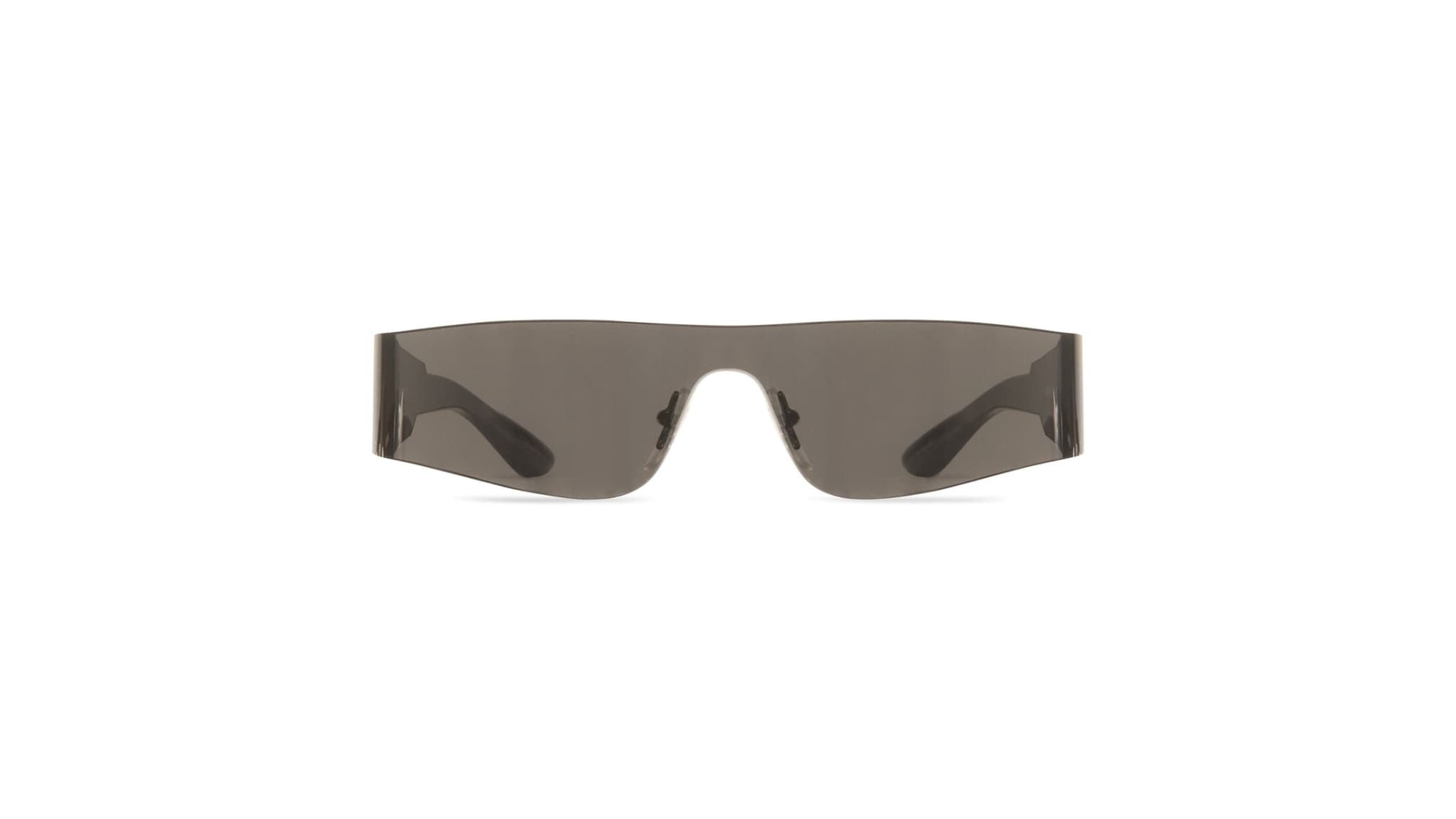 Les lunettes de soleil mono rectangle Balenciaga. Les lunettes de soleil mono rectangle Balenciaga.