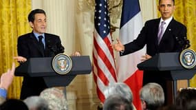 Lors d'une conférence de presse commune à la Maison blanche, Barack Obama et Nicolas Sarkozy ont ont déclaré que le temps était venu de sanctionner l'Iran pour son programme nucléaire. /Photo prise le 30 mars 2010/REUTERS/Jonathan Ernst