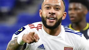 L'attaquant néerlandais de Lyon, Memphis Depay, célèbre son but marqué contre Monaco, lors de leur match de L1, le 25 octobre 2020 au Groupama Stadium à Décines-Charpieu