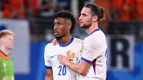 Kingsley Coman et Adrien Rabiot après le match de l'équipe de France contre les Néerlandais, 21 juin 2024