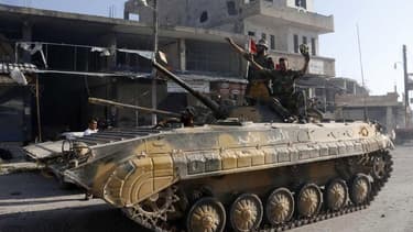 Les soldats du régime de Bachar al Assad lors de la prise de Koussaïr début juin. Le ministère français des Affaires étrangères a estimé mardi que le conflit syrien a connu un tournant après la reconquête de cette ville, ce qui implique de réexaminer l'op