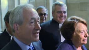 Jean et Xavière Tiberi dans les couloirs du Palais de justice de Paris