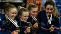 ) France's Victoire Berteau, France's Valentine Fortin, France's Clara Copponi and France's Marion Borras celebrate with their bronze medals