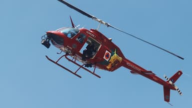 Un hélicoptère de la sécurité survole un exercice de simulation de séisme au Mexique, le 20 septembre 2024