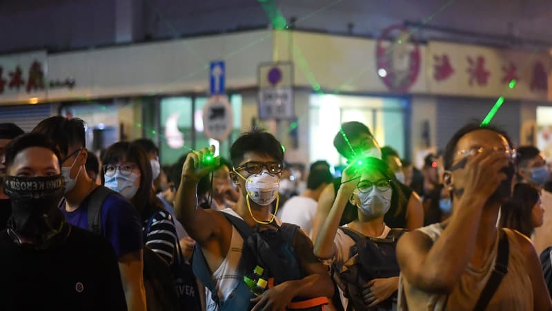 Des manifestants pro-démocratie dans les rues de Hong-Kong, le 14 août 2019.