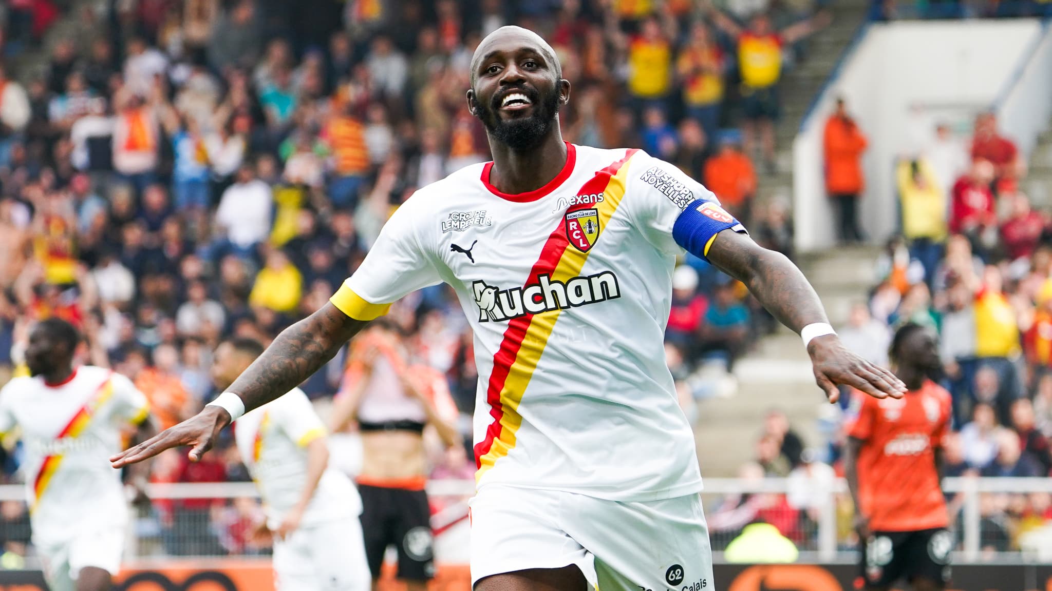 President Joseph Oughourlian of RC Lens pictured celebrating with Florian  Sotoca (7) of RC Lens and Seko Fofana (8) of RC Lens after winning a soccer  game between t Racing Club de