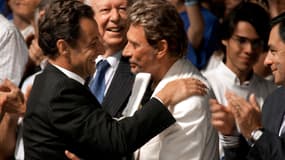 Nicolas Sarkozy et Johnny Hallyday, le 3 septembre 2006 à un congrès d'été de l'UMP à Marseille. 