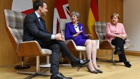 Emmanuel Macron, Theresa May et Angela Merkel à Bruxelles en mars 2018.