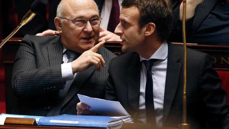 Michel Sapin - ici avec Emmanuel Macron - s'est félicité des chiffres du déficit public pour 2015. 