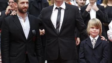 Le réalisateur Markus Schleinzer, entouré de Michael Fuith (à gauche) et David Rauchenberger, les deux acteurs principaux de "Michael", film dont la force est de présenter de manière crue un quotidien qui serait banal, s'il n'était celui d'un pédophile. /