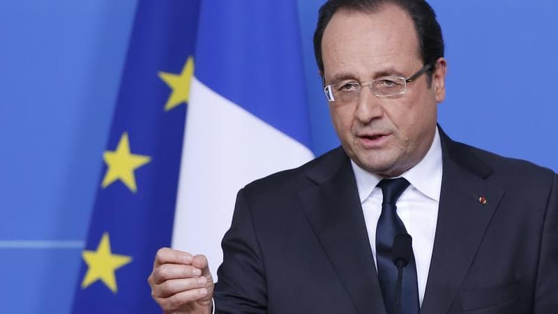 François Hollande invite le gouvernement à "se bouger" tout l'été au service des Français pour répondre par un volontarisme réaffirmé à la déprime sociale et une colère latente, à un an des élections municipales et européennes. /Photo prise le 28 juin 201