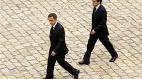 La cote de popularité de Nicolas Sarkozy reste stable en juillet avec 35% de bonnes opinions, mais François Fillon chute de trois points à 44%, contre 47% en juin, selon un sondage Ipsos pour Le Point. /Photo d'archives/REUTERS/Benoît Tessier