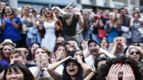Des supporters français réagissent au match France-Portugal à New York, le 10 juillet 2016. 