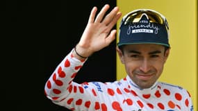La joie du Français Lenny Martinez avec le maillot à pois sur le Tour de France, le 14 juillet 2025