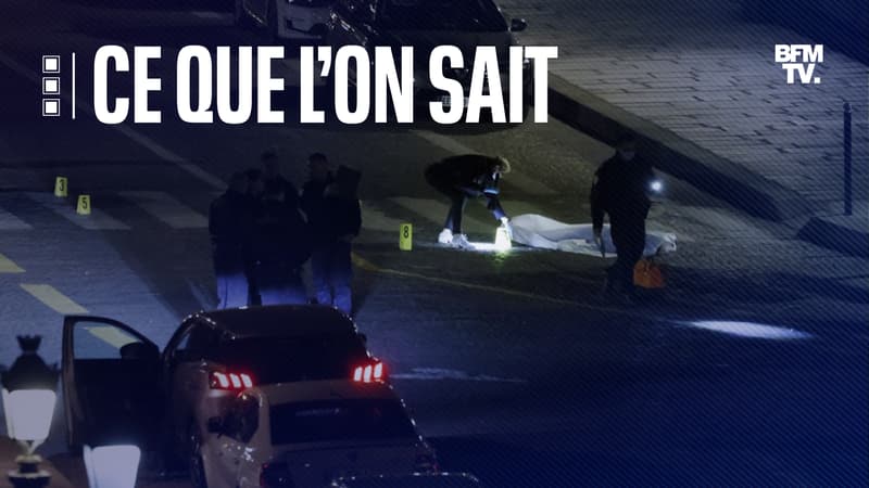 Un policier se trouve autour du corps d'une des deux personnes mortes dans la nuit du 24 au 25 avril 2022 à Paris, sur le Pont-Neuf.