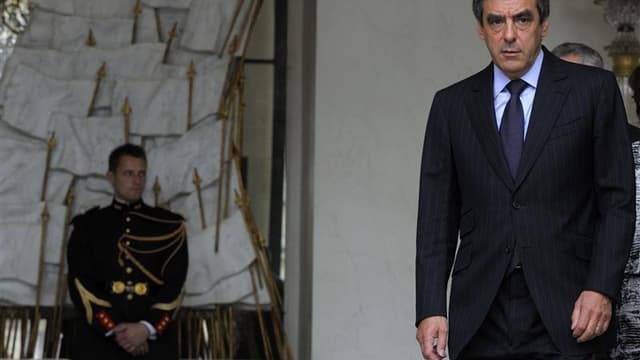 François Fillon à la sortie du dernier conseil des ministres du gouvernement sortant, mercredi à l'Elysée. Après cinq années passées à Matignon, François Fillon a fait remettre jeudi la démission de son gouvernement à Nicolas Sarkozy, quatre jours après l