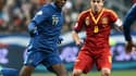 Paul Pogba face à Xavi