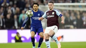 John McGinn et Marquinhos lors d'Aston Villa-PSG, le 15 avril 2025 en Ligue des champions