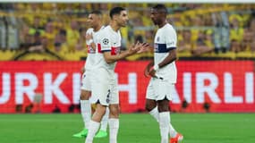 Achraf Hakimi et Ousmane Dembélé lors de Dortmund-PSG, le 1er mai 2024 en Ligue des champions
