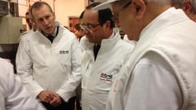 François Hollande et Guillaume Garot en visite au pavillon carné à Rungis