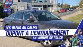 France - Italie : Dupont et Marchand de retour de l'entraînement en voiture de police 